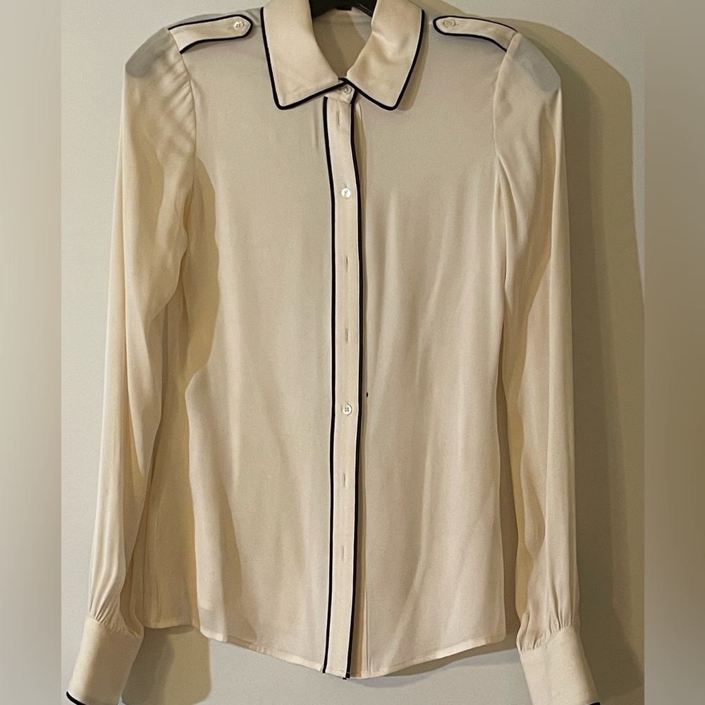 Rachel Zoe blouse size 2, winter white with black piping on arms, pockets, etc.